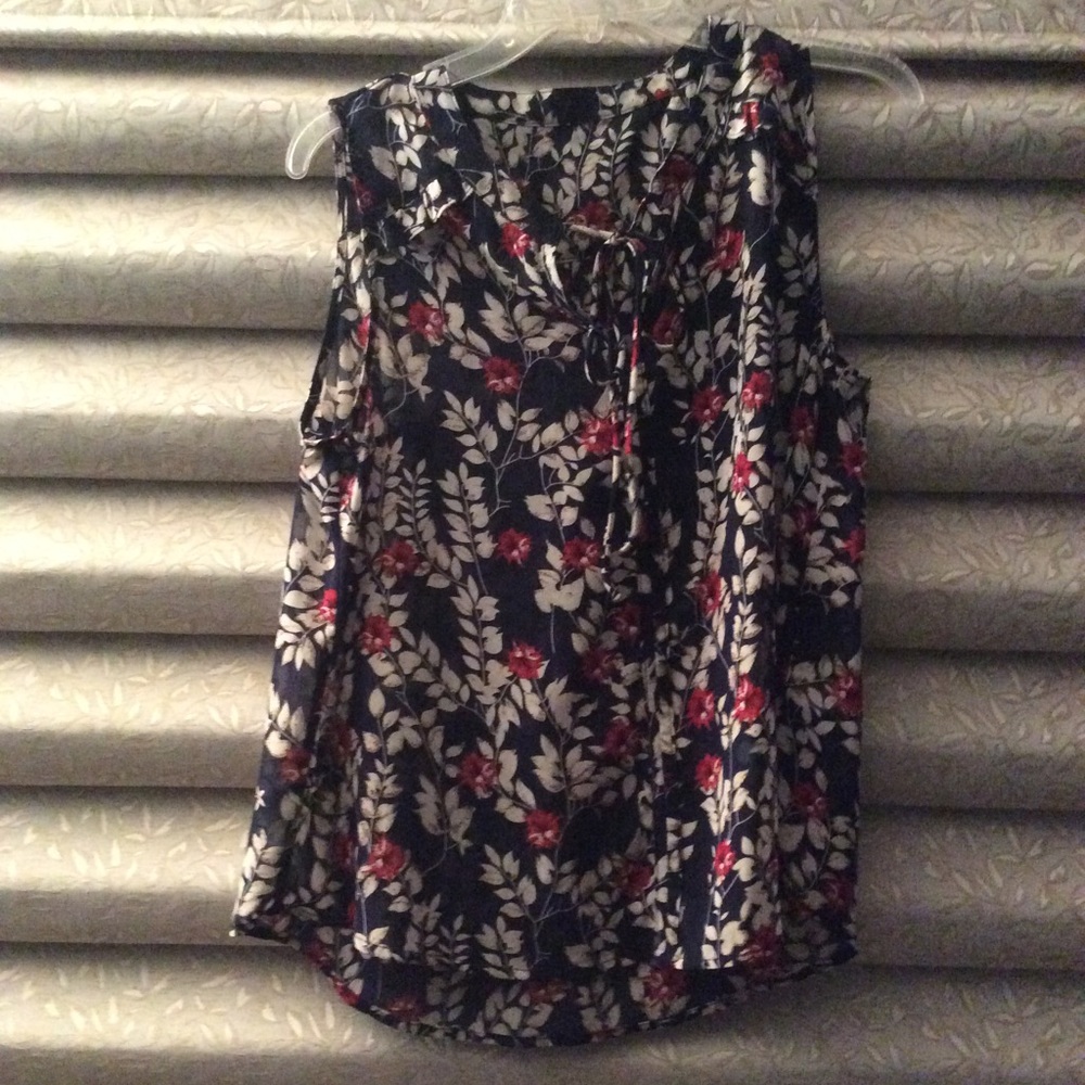 Sheer sleeveless blouse. Navy floral pattern M